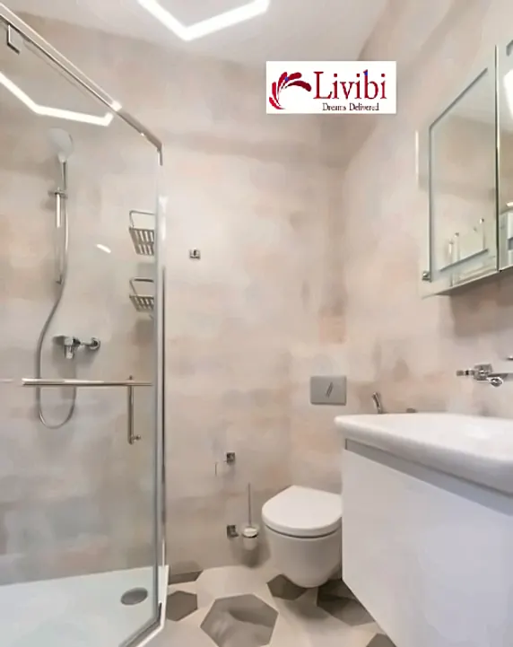 Close-up shower and tile detail from a Livibi bathroom project
